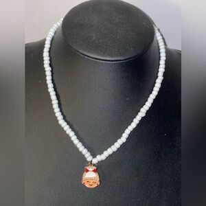 Charming White Beaded Necklace with Gold Pendant